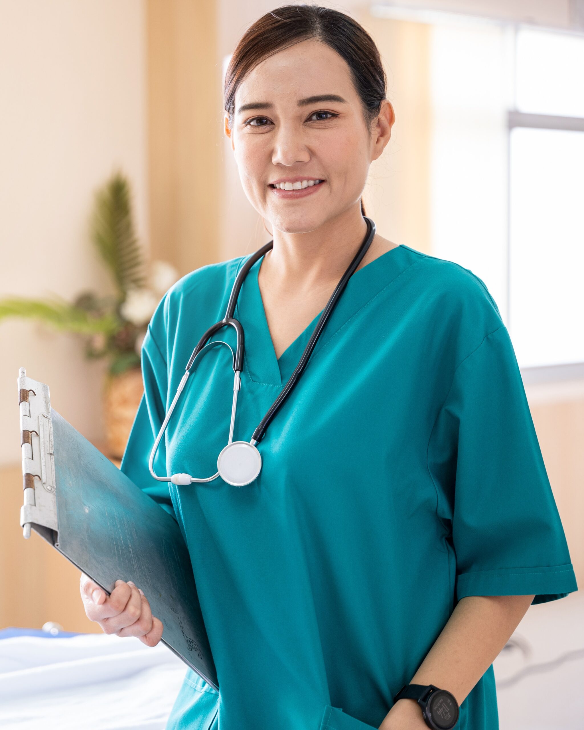 bigstock-Portrait-Of-A-Smiling-Nurse-Or-450577313