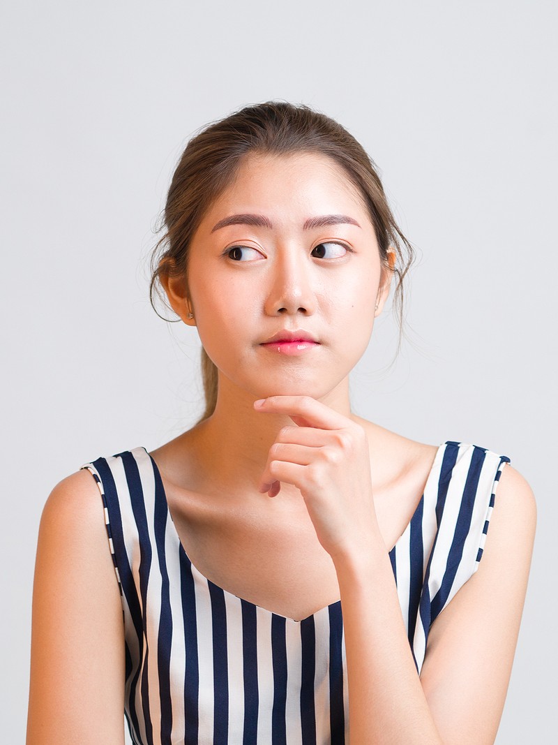 When Should I Take a Pregnancy Test? A woman wondering "When should I take a pregnancy test?"