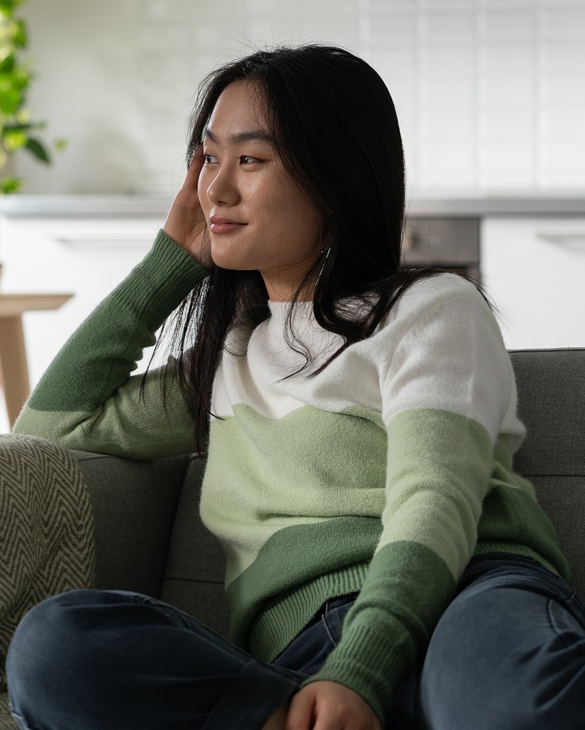 A woman wondering "What are the next steps in pregnancy testing?"