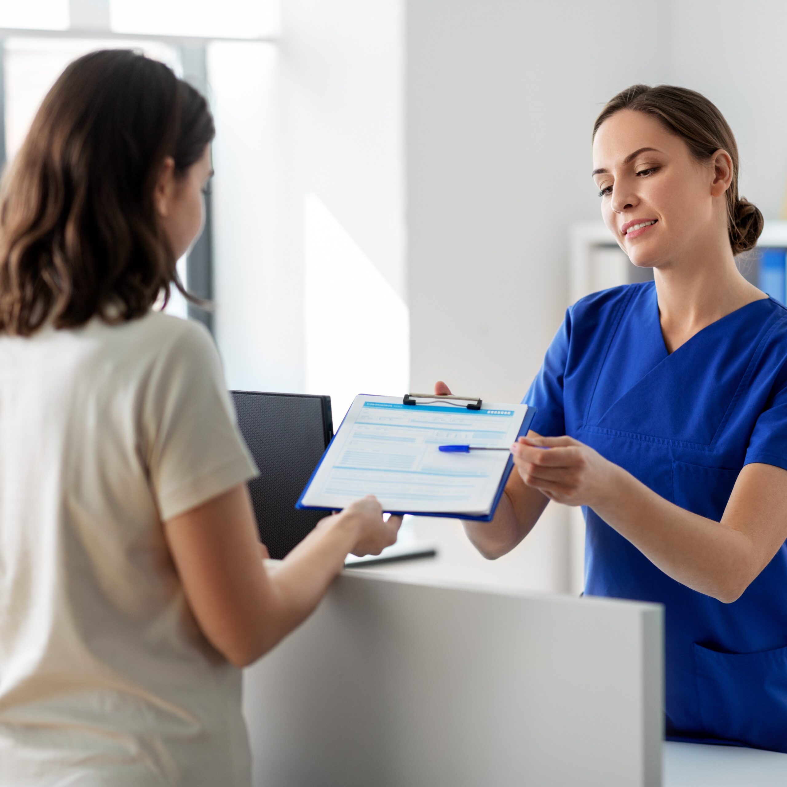 Gonorrhea Symptoms and Effects A woman talking to a medical professional about Gonorrhea information