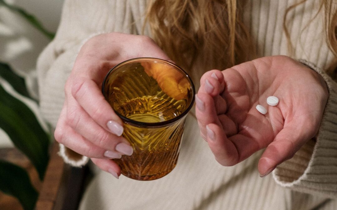 woman taking abortion pill