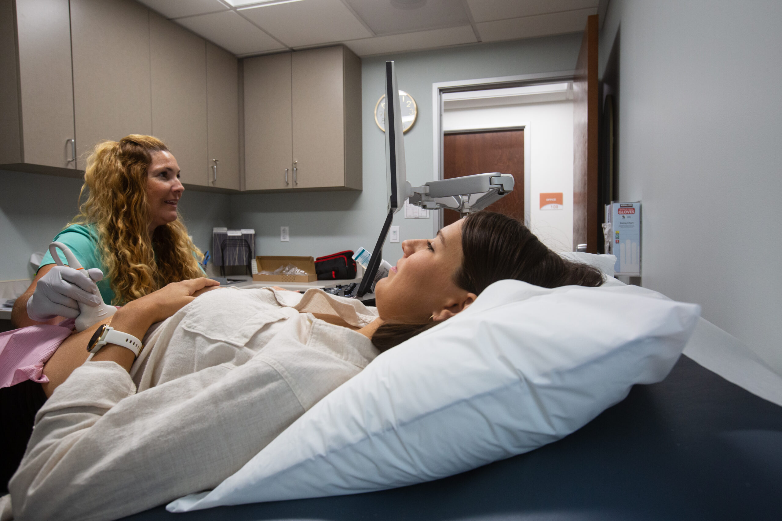 A woman receiving a free ultrasound in California