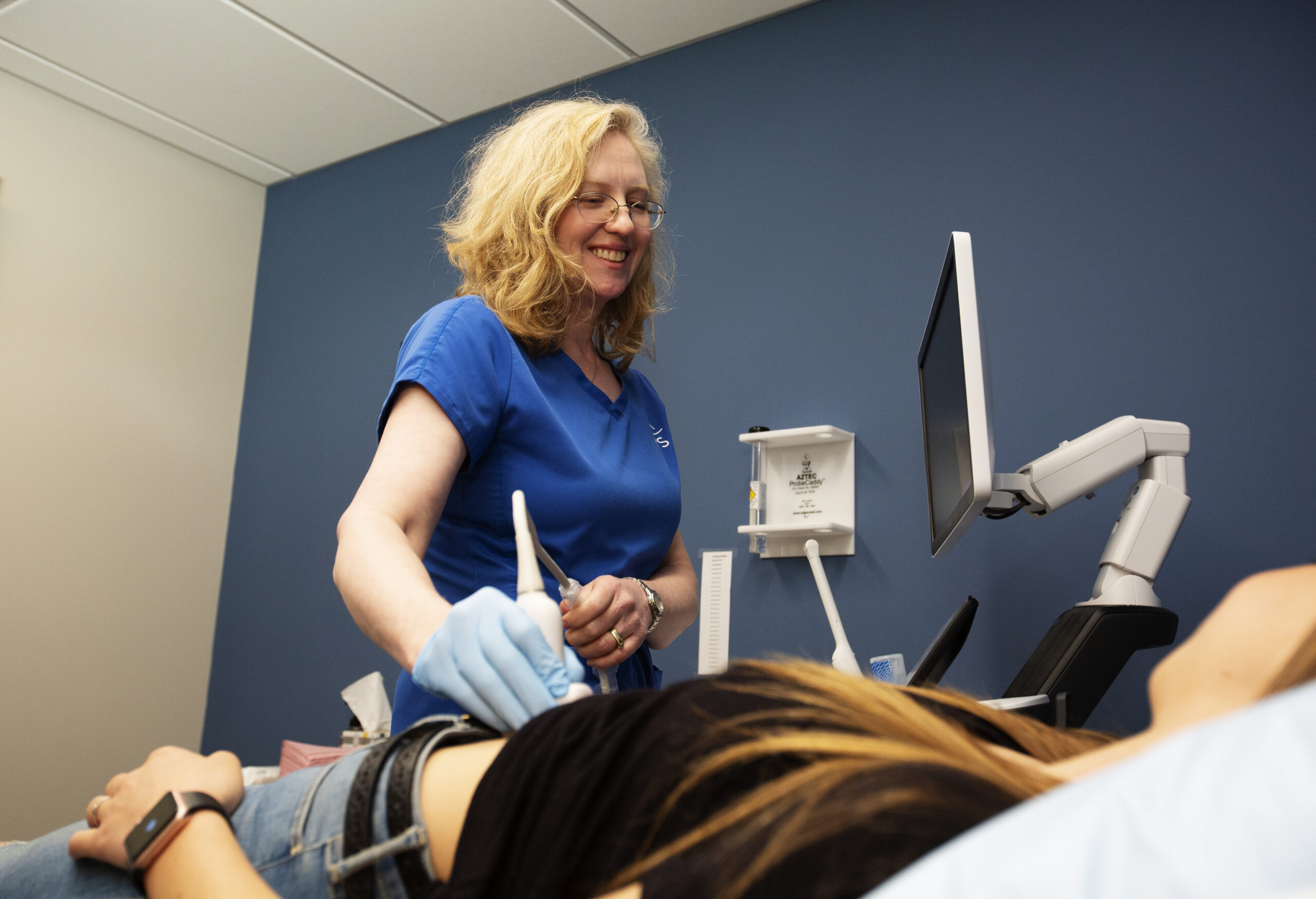 A woman receiving a free ultrasound in California